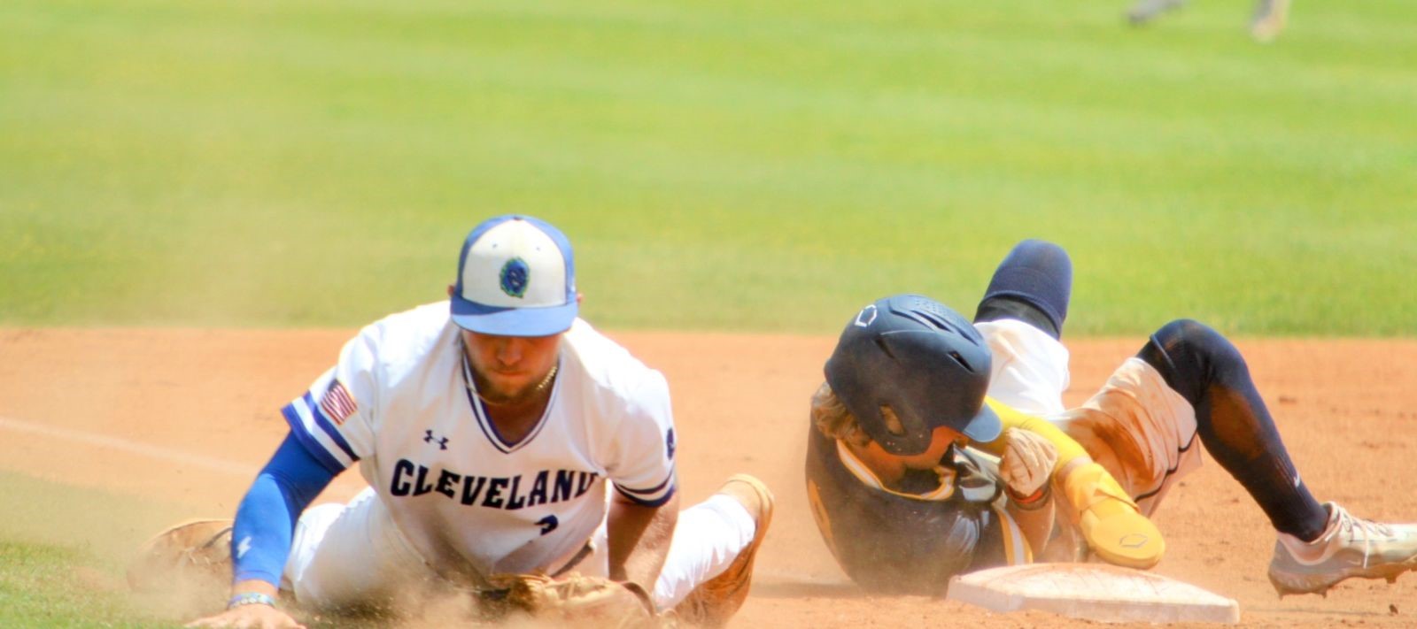 Gaston College's Trent Murchison slides into third base for a stolen base during Sunday's win at Cleveland Community College.