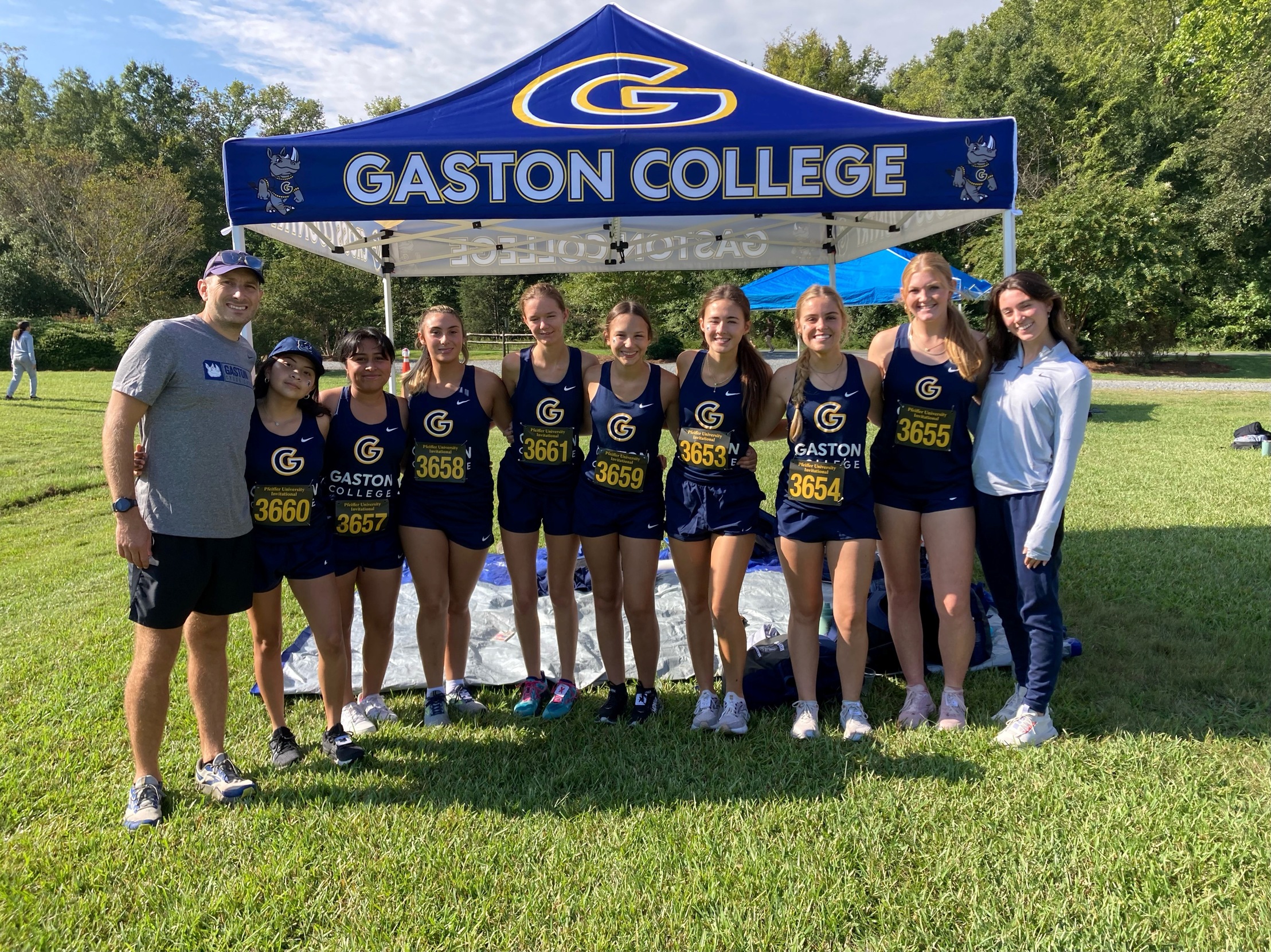 Gaston College women's cross country coach Kody Kubbs (far left) and his 2023 team before their debut in Saturday's Pfeiffer Invitational.