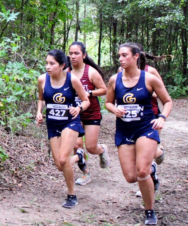 Gaston College's Stefani Vergara-Delgado (left) will enter this week's Region 10 championships after taking her first career team medalist honors.