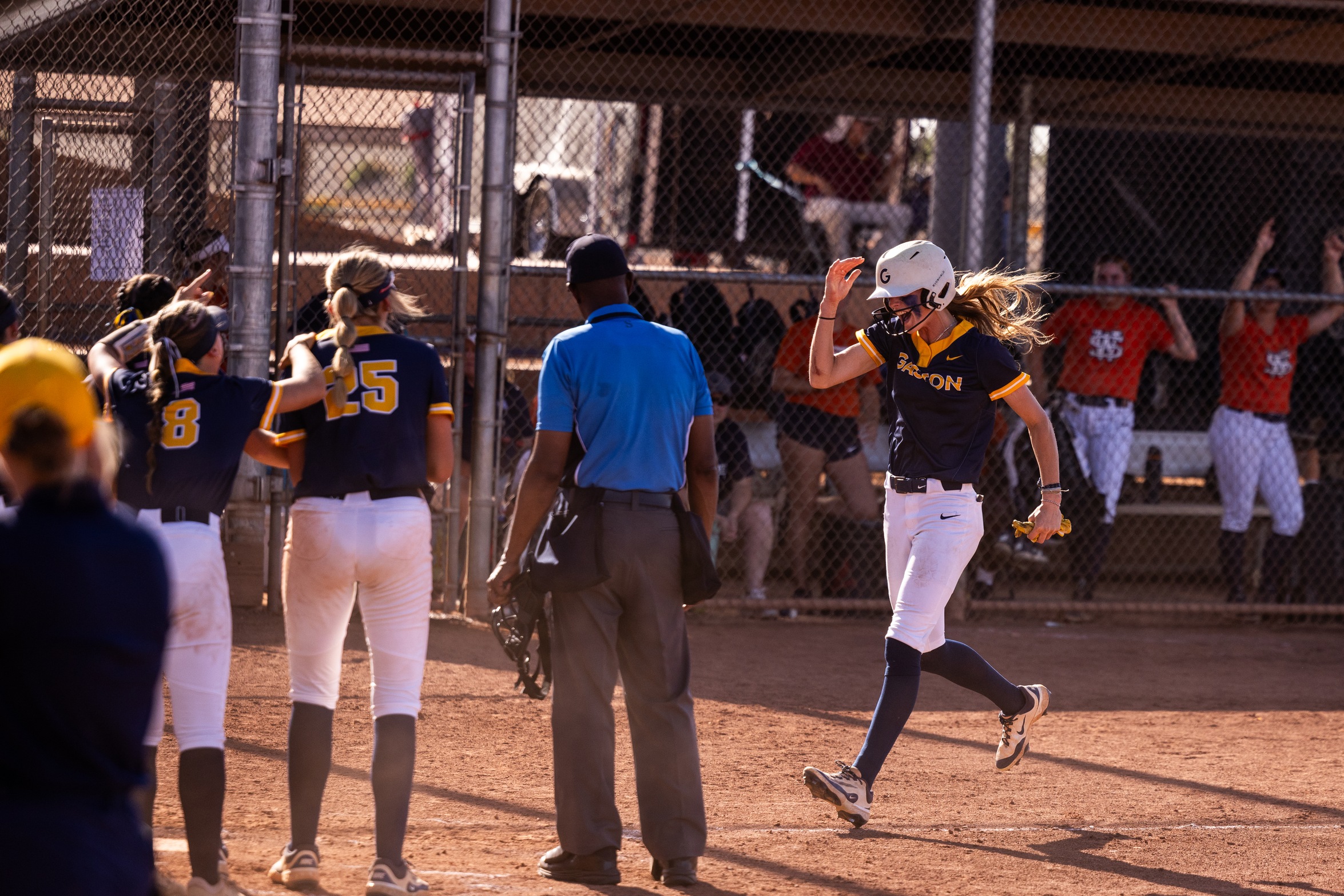 Gaston College's Sarah Johnson heading to home plate after her three-run home run in the Rhinos' final game of their record-setting 2025 season.